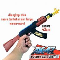 Pistol Mainan Suara